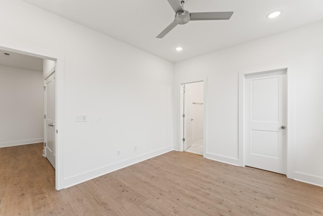 unfurnished bedroom featuring ceiling fan and light hardwood / wood-style flooring