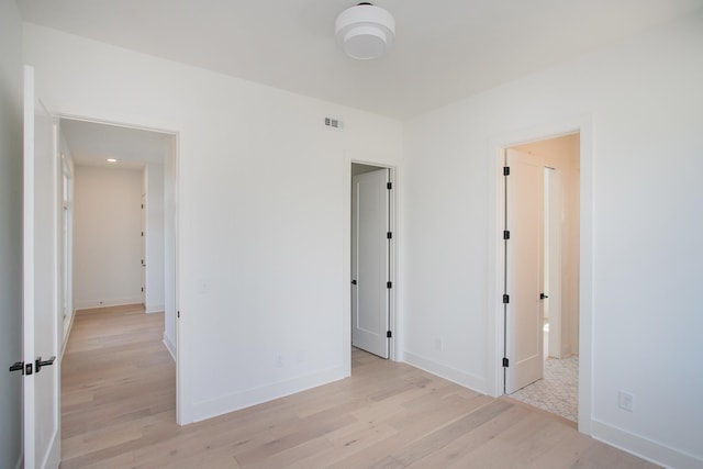 unfurnished bedroom featuring light hardwood / wood-style flooring