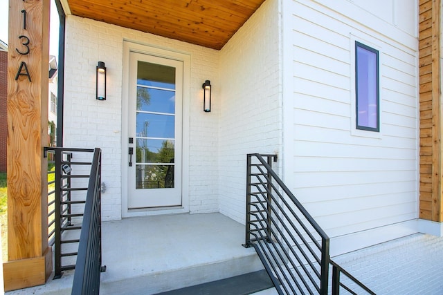 entrance to property with a porch