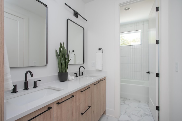 bathroom with vanity and bathing tub / shower combination