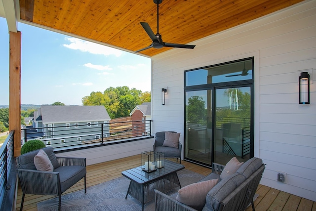 wooden deck with ceiling fan