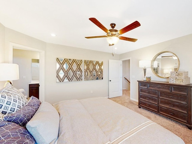 carpeted bedroom featuring ceiling fan