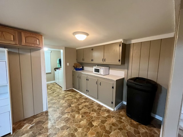 kitchen with washer and clothes dryer