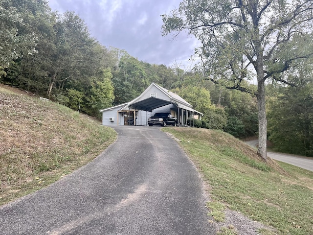 ranch-style home with a carport