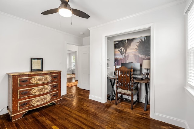 office area with ceiling fan, crown molding, and dark wood-type flooring