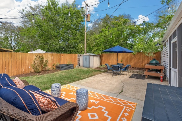 view of patio / terrace featuring area for grilling and a storage shed