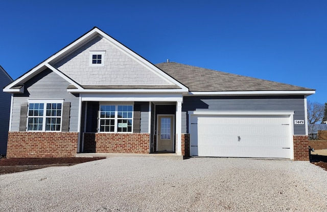 craftsman inspired home featuring a garage