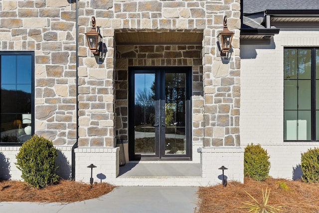 doorway to property featuring french doors