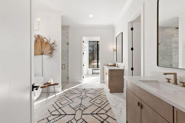 bathroom featuring crown molding, vanity, and a shower with shower door