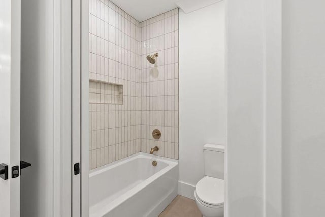 bathroom with shower / bathtub combination and toilet