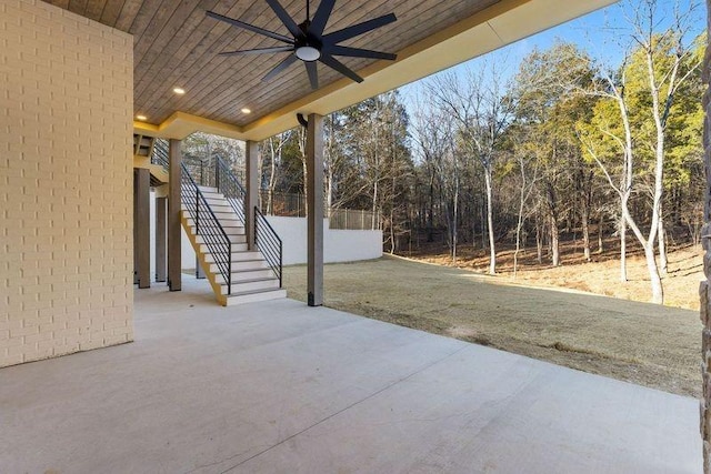 view of patio featuring ceiling fan