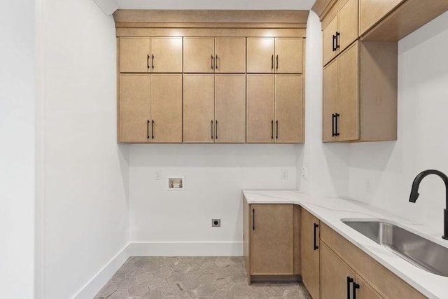 laundry area with sink, cabinets, washer hookup, light tile patterned floors, and electric dryer hookup