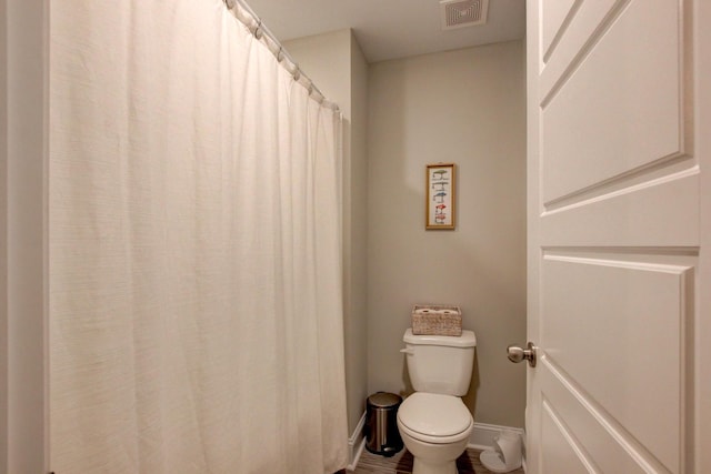 bathroom featuring toilet