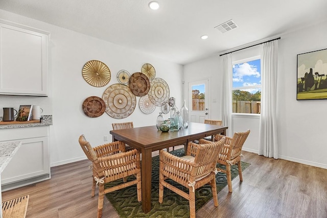 dining room featuring light hardwood / wood-style floors