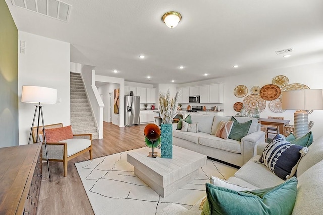 living room featuring light wood-type flooring