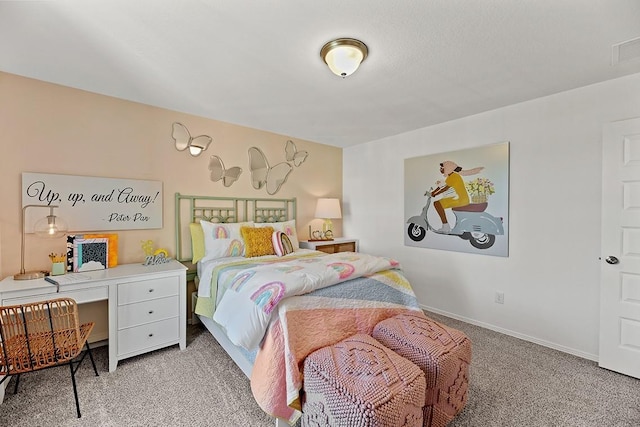 bedroom featuring light colored carpet