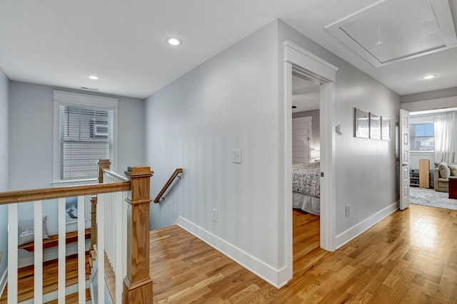 hall with light wood-type flooring