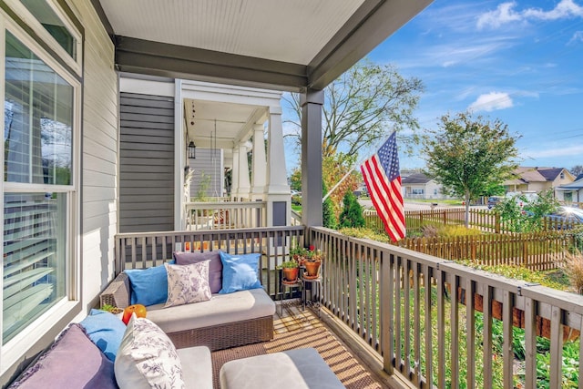 balcony featuring a porch