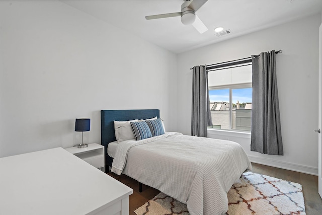 bedroom featuring hardwood / wood-style flooring and ceiling fan