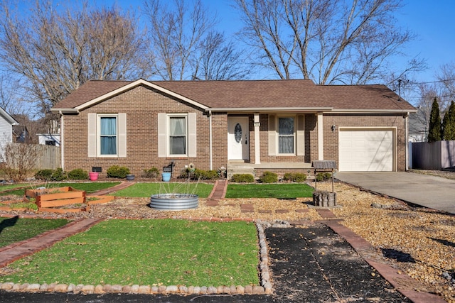 ranch-style house featuring a front yard and a garage