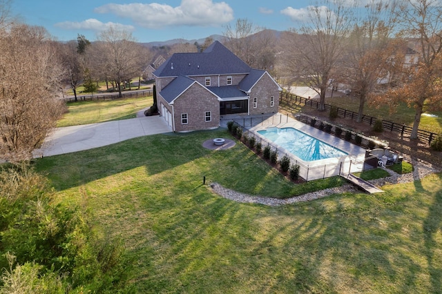 drone / aerial view featuring a mountain view