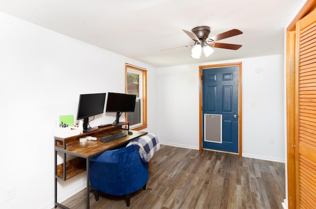 office space featuring ceiling fan and dark hardwood / wood-style flooring