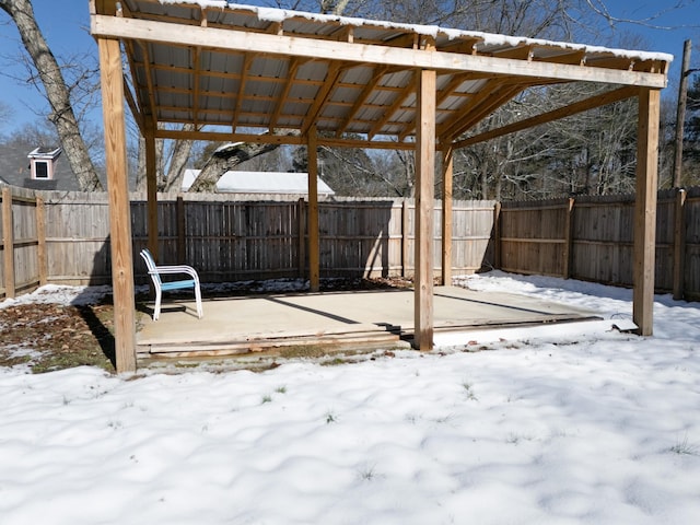 view of snow covered patio