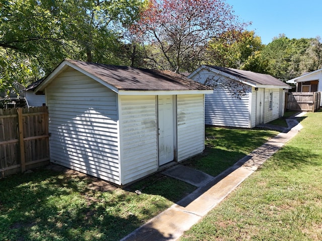 view of outdoor structure with a yard