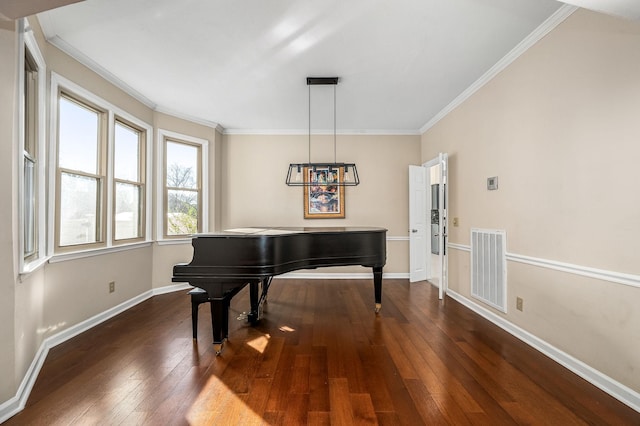 misc room with crown molding and dark hardwood / wood-style floors