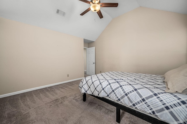 carpeted bedroom with vaulted ceiling and ceiling fan