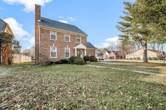 view of front of home with a front yard