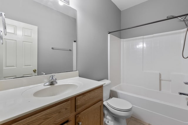 full bathroom featuring tile patterned floors, shower / tub combination, vanity, and toilet