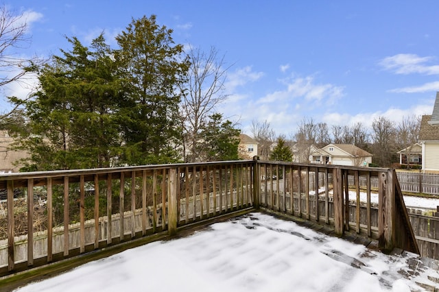 view of snow covered deck