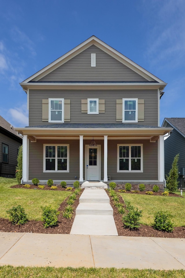 view of front facade with a front lawn