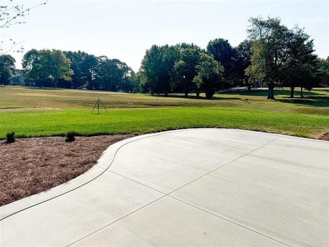 view of home's community featuring a lawn