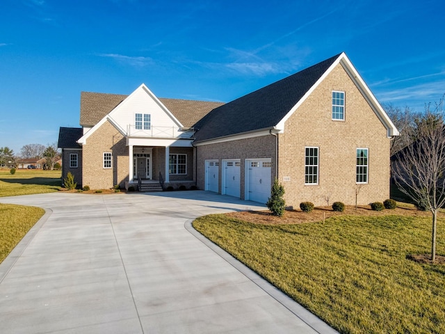 view of front facade with a garage and a front lawn