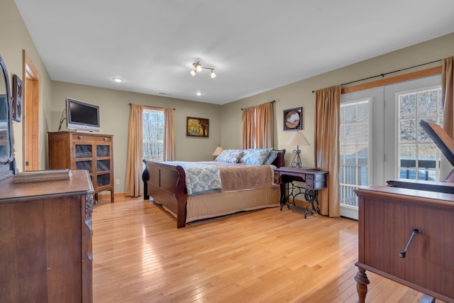 bedroom with light wood-type flooring