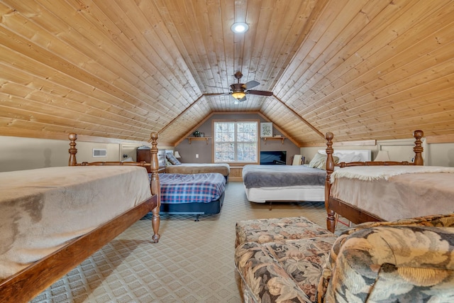 carpeted bedroom featuring ceiling fan, wood ceiling, and vaulted ceiling