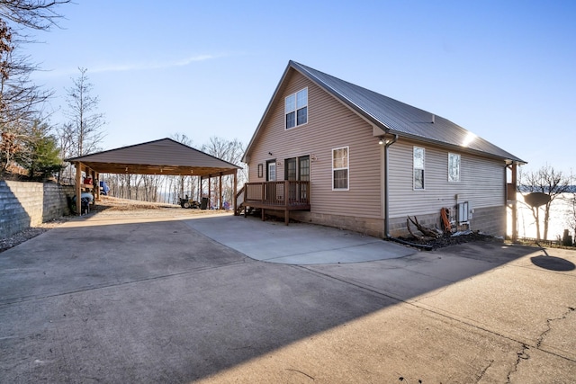 rear view of house with a carport