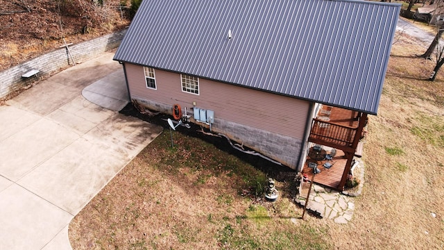 view of home's exterior featuring a deck