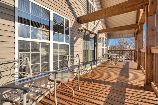 wooden terrace featuring a porch