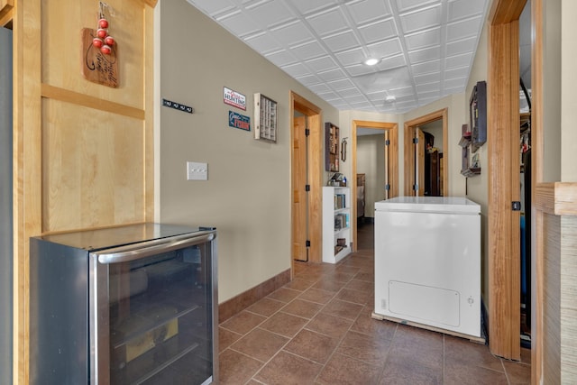 interior space featuring washer / dryer and wine cooler