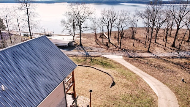 exterior space with a water view