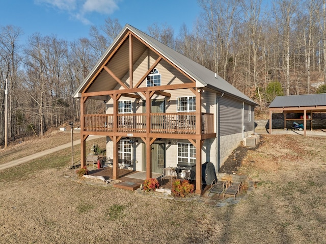 view of front of home with a wooden deck