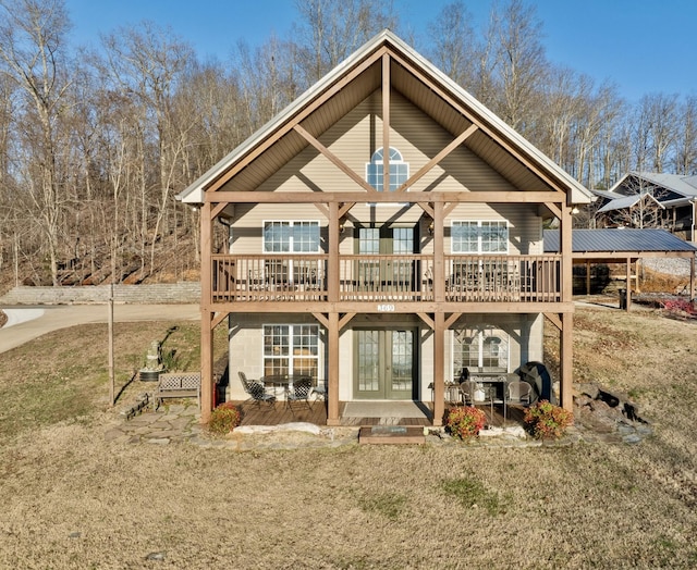 back of house with french doors and a patio area