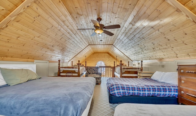 bedroom with lofted ceiling, wood walls, wooden ceiling, and carpet flooring