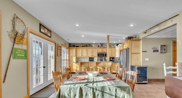 dining area featuring recessed lighting, french doors, and baseboards