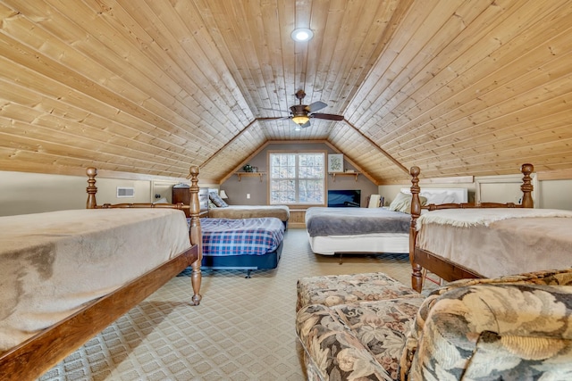 carpeted bedroom featuring vaulted ceiling, visible vents, and wood ceiling