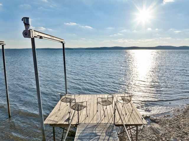 view of dock with a water view