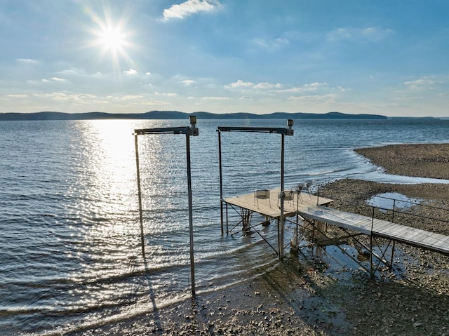 view of dock with a water view